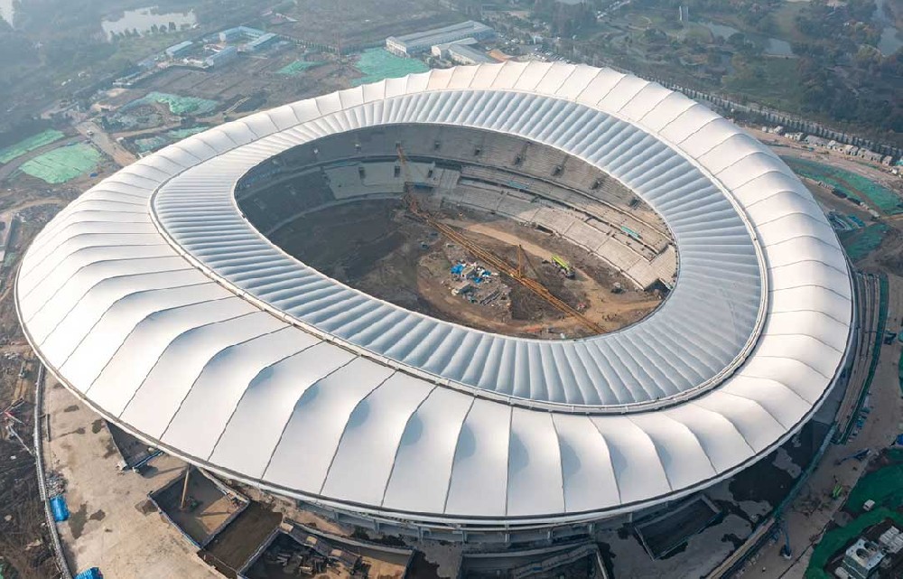 【无锡奥体中心】“羽翼”全舒展，水色天光下的白鹭“振翅高飞”